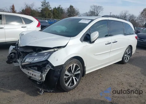 2020 Honda Odyssey Elite z USA, uszkodzony, nr VIN 5FNRL6H94LB045159